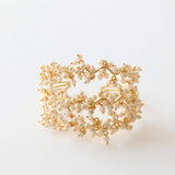 Brazalete Clust